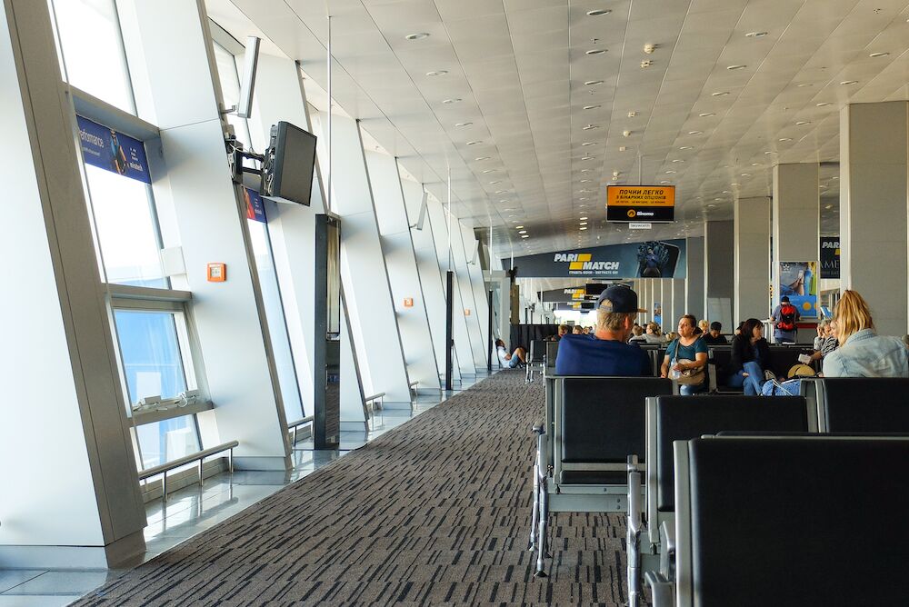 People wait for their flight
