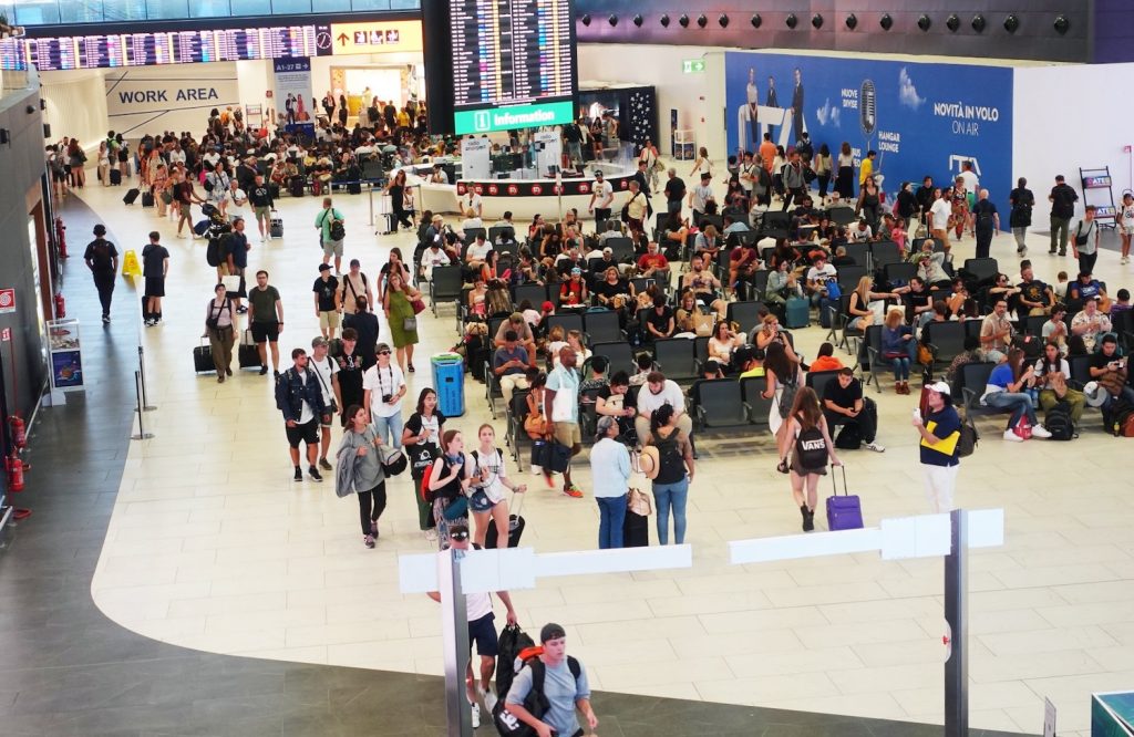 Crowds of people at an airport