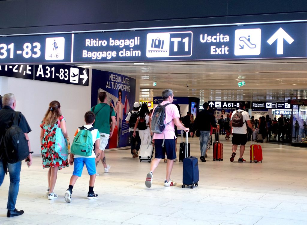 People walking out of the airport