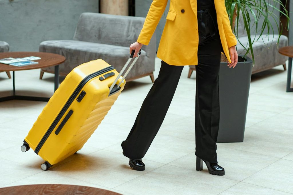 Woman with a yellow suitcase
