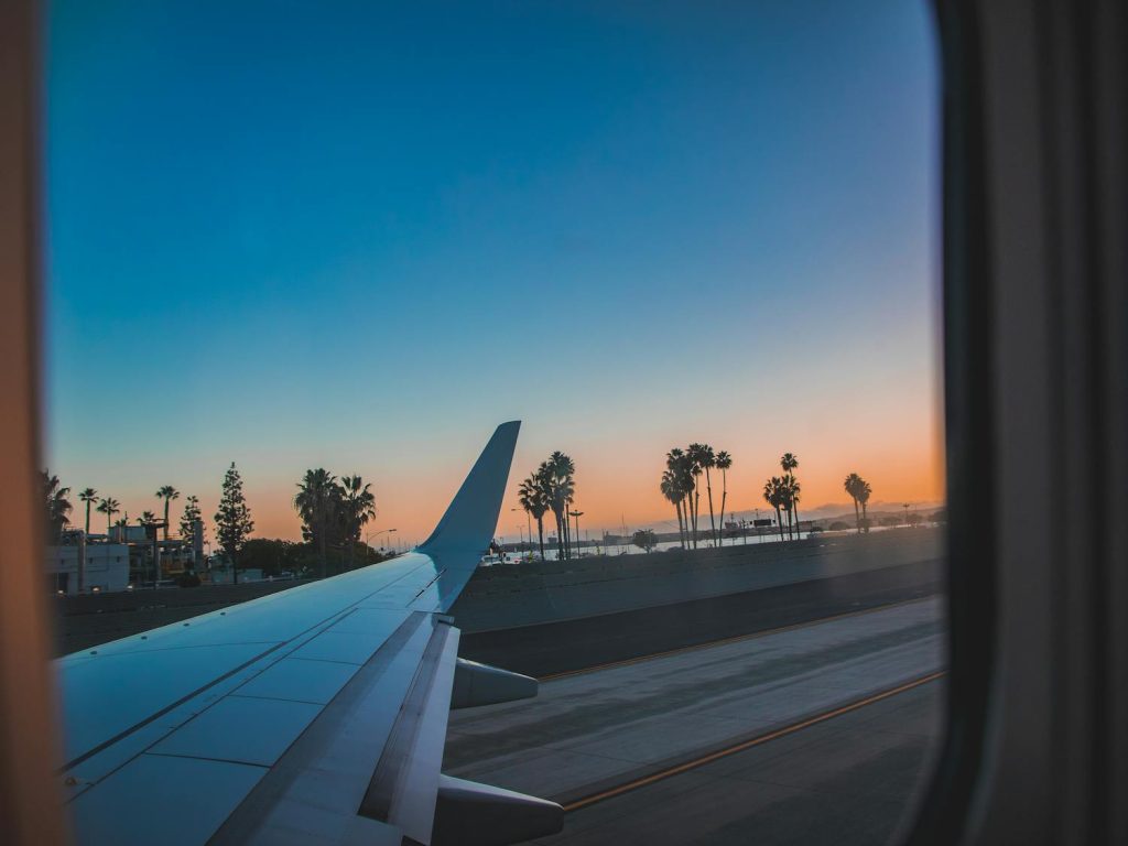Airplane window view in the tropics